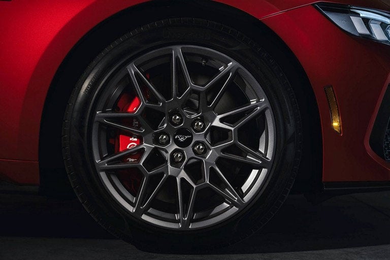 2024 Ford Mustang® model with a close-up of a wheel and brake caliper | Donley Ford Shelby in Shelby OH